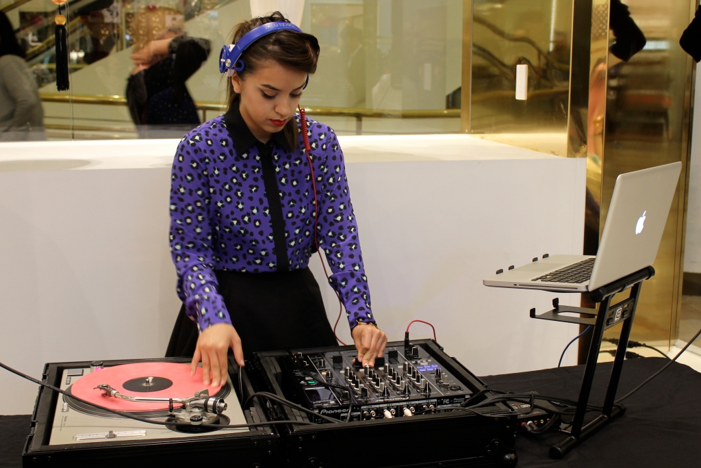 DJ wearing Kate Spade blouse